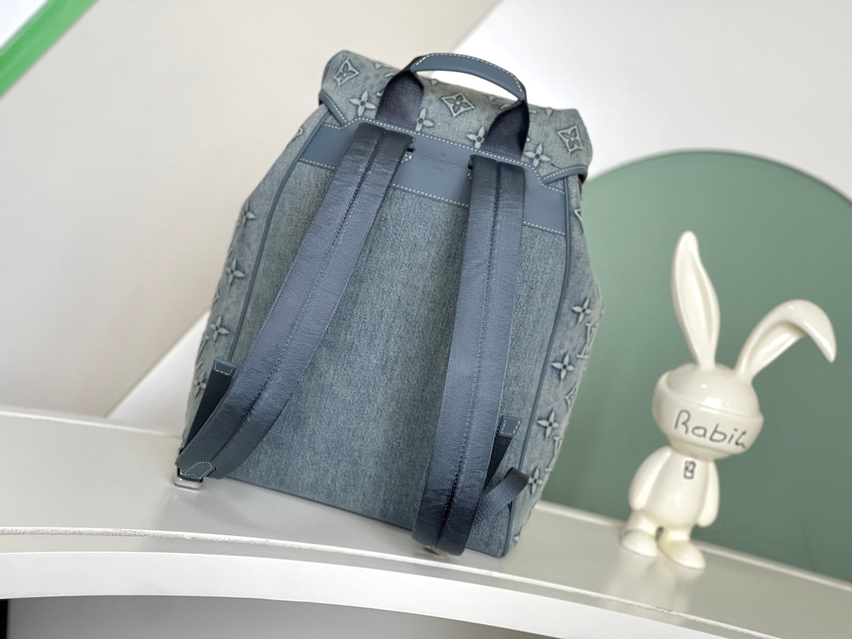 LV Monstsouris Faded Denim Backpack