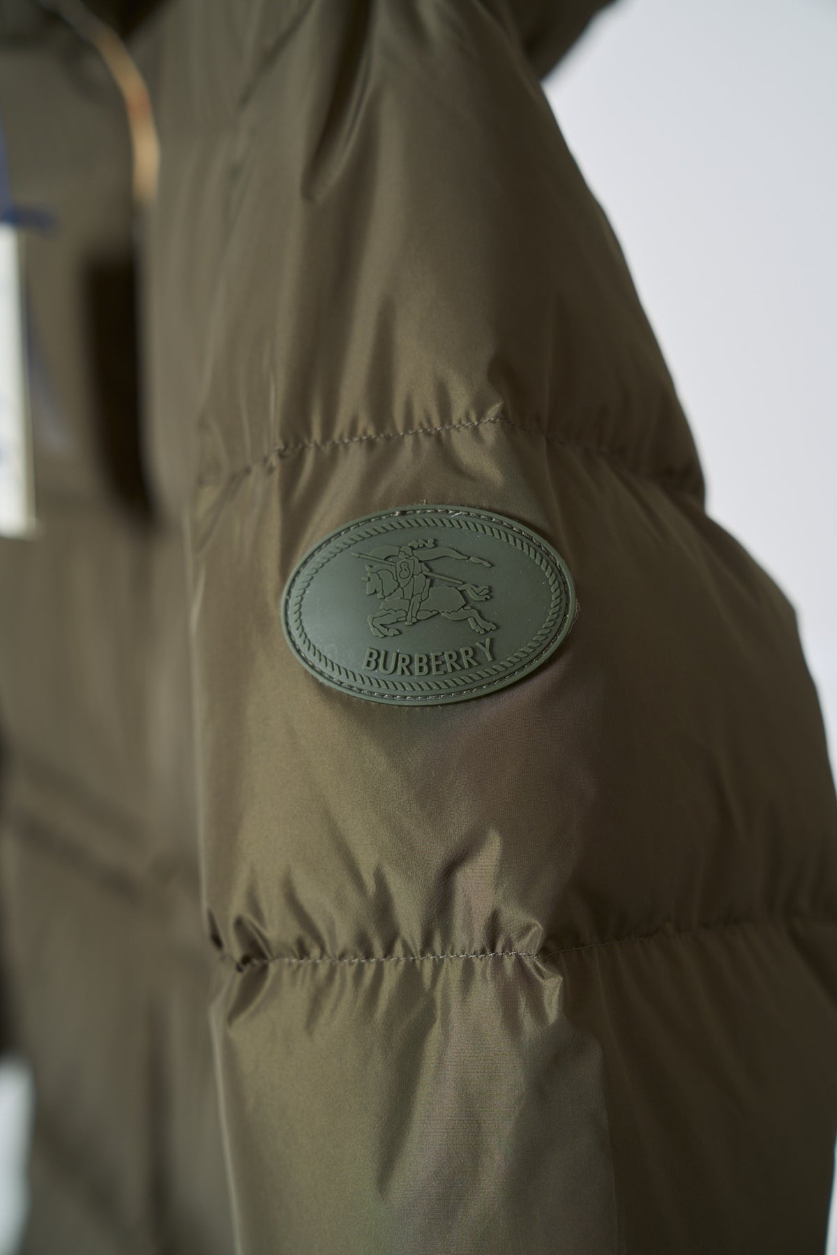Burberry Plaid Med Length Hooded Down Jacket - Women's