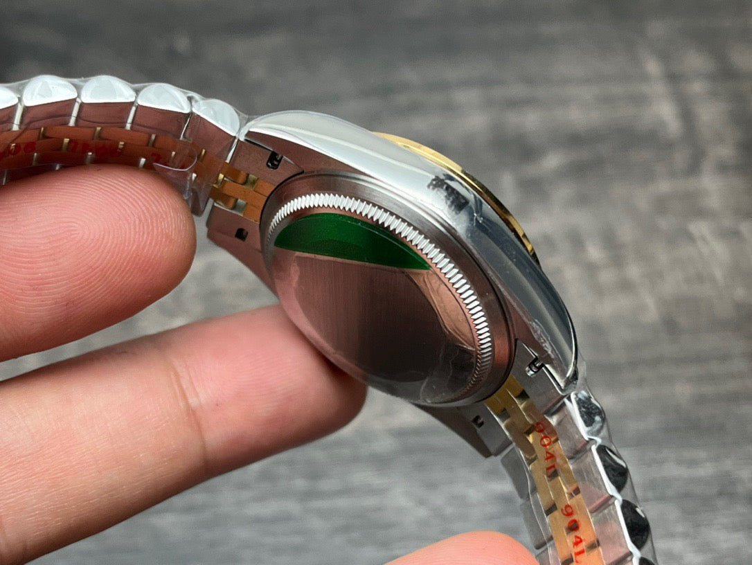 Rolex Datejust 31mm green dial with gold accents