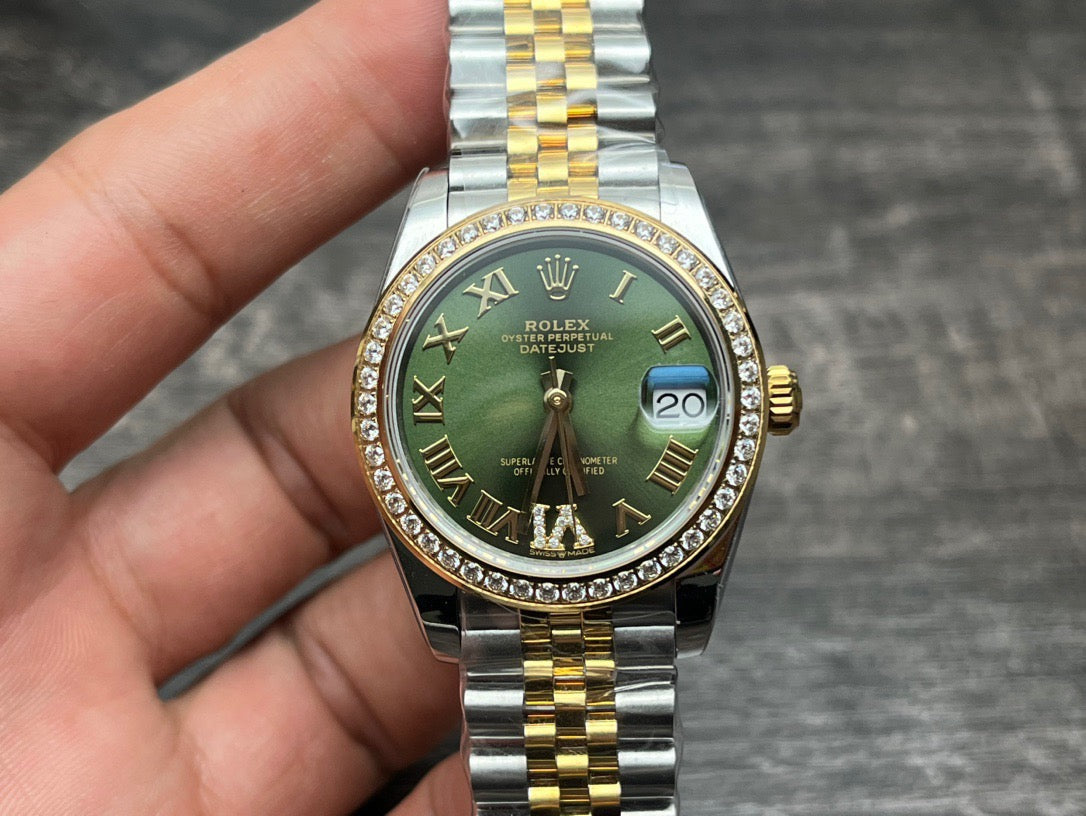 Rolex Datejust 31mm green dial with gold accents