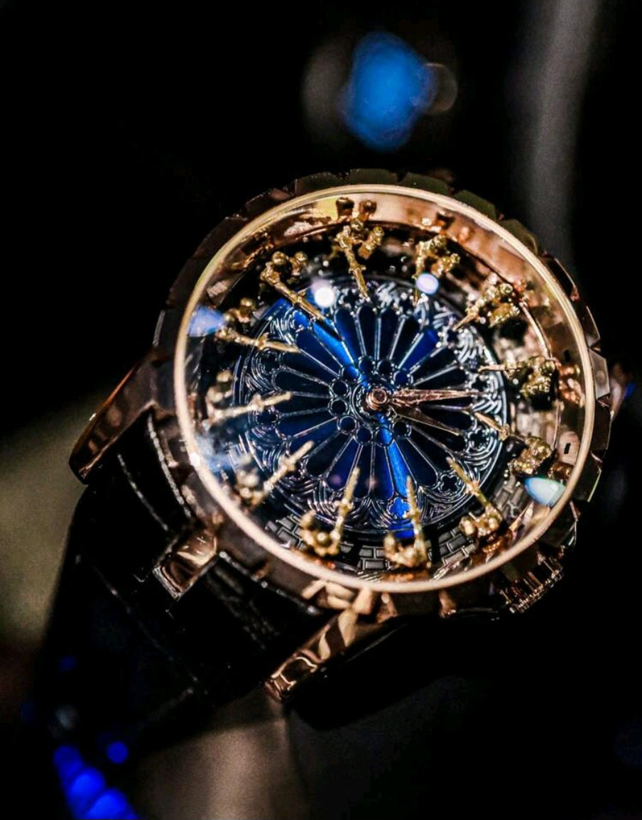 Luxury Black and Gold Watch with Blue Dial